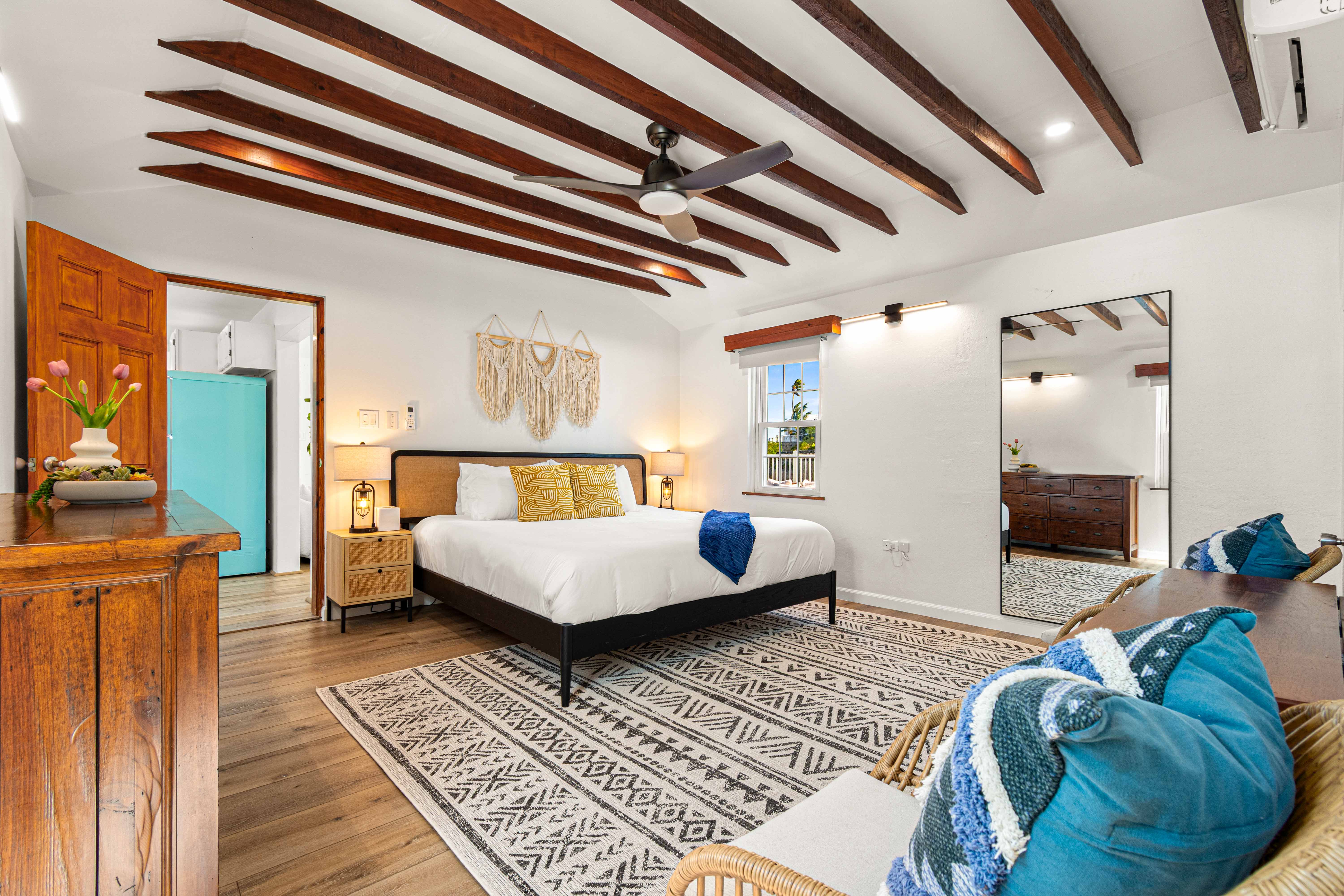 Master bedroom with exposed beams